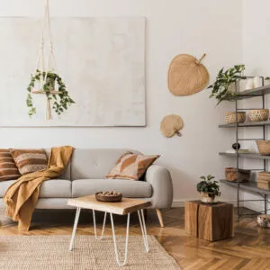 Model wearing minimalist watch with black wristband and white watch face.